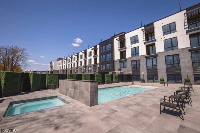 Outdoor pool and hot tub area