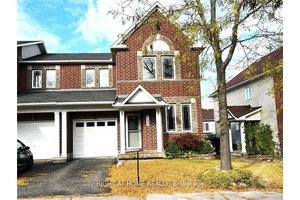 This spacious 3 bed 3. 5 bath popular Minto Helmsley model End unit has Home Office on the main floor and full bathroom on the basement.