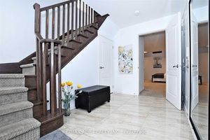 Fabulous Open Concept Home in Desirable Woodland Hills.