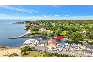 Waterfront Commercial Opportunity Welcome to a once in a lifetime waterfront commercial property located in the heart of a thriving historic downtown and marine district.