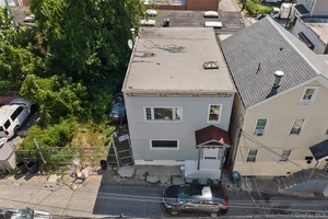 Welcome to this FULLY RENOVATED two family home !