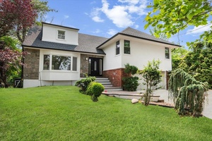Welcome to this Stunningly Renovated 5 Bedroom 3.