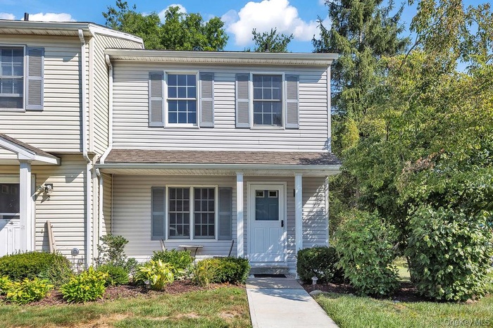 View of front of house with covered porch