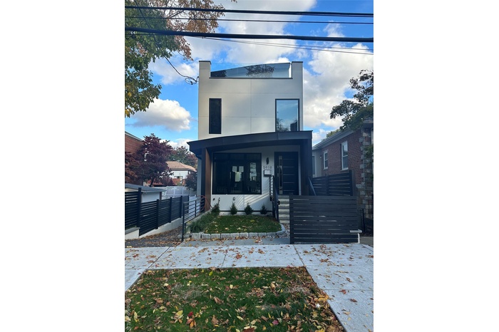 Contemporary home with a fenced front yard