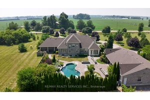 214 Maple Ave S, Burford Luxury Country Estate with Endless Possibilities Welcome to your dream country estate where elegance, space, and opportunity converge in perfect harmony.