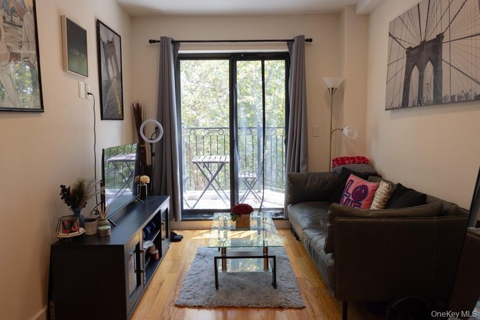 Living room featuring wood finished floors