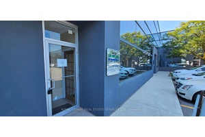Professional second floor office space featuring two private offices, an open reception area, and a washroom.