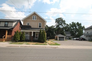 Beautiful, Brick, Legal Duplex On A Large, Fenced Lot With A Detached Garage With Both Units Vacant.