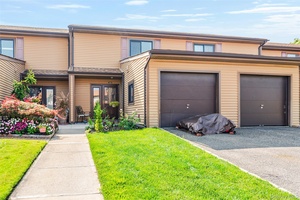 Oceanside Cove Phase 1 duplex with converted garage.
