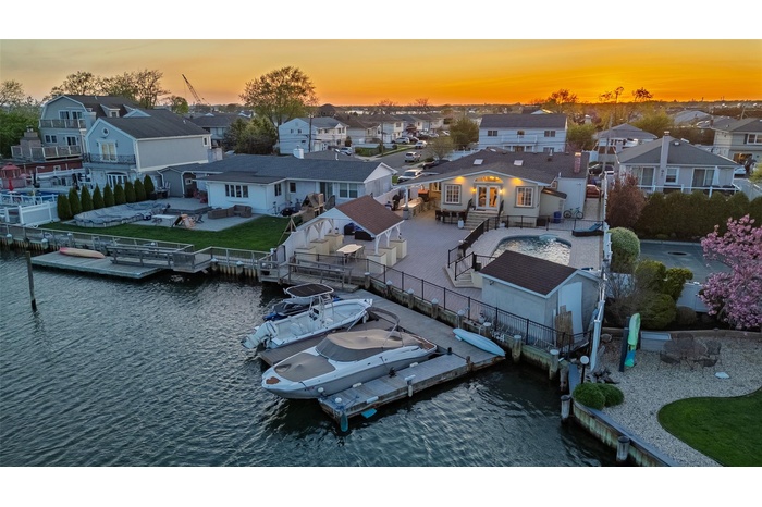 Aerial view at dusk of a residential view and a water view