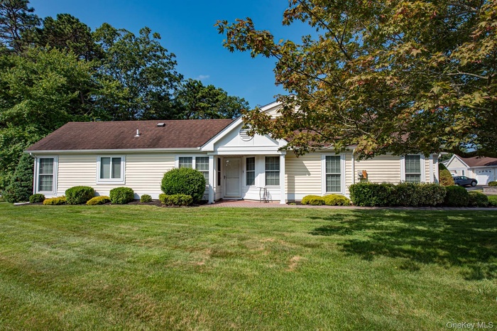 View of front of house with a front lawn