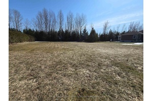 Build your dream home in the serene lakeside community of Poplar Beach !