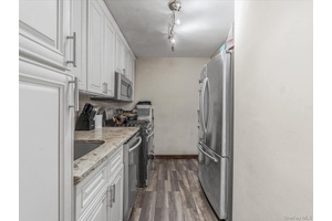 Welcome to Unit 6C at 94 31 59th Avenue a rarely available 3 bedroom, 2 bath co op offering an expansive layout and unbeatable convenience in the heart of Elmhurst.