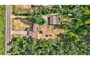 Executive Family Home Nestled On 10 Acres Of Private Land With 1, 200 SqFt Detached, Insulated Workshop With Double 7x9Ft Doors, amp ; a second Driveway.