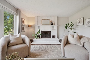 Charming red brick duplex with income potential in a prime Guelph location.