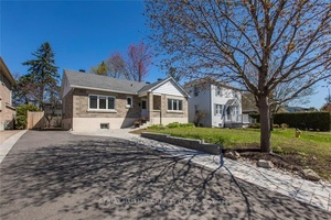 A fully updated, chic mid century modern bungalow on a quiet, family friendly street with no rear neighbours !