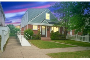 Welcome to this charming legal two family home in the heart of Bellerose, featuring 3 bedrooms and 3 bathrooms.