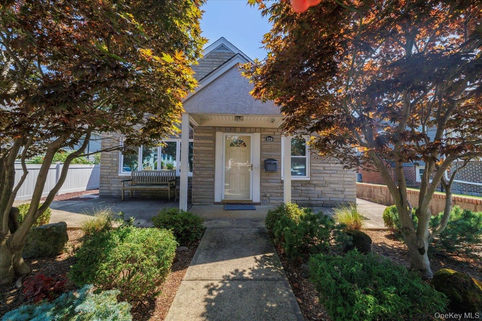 View of front of house featuring stone siding
