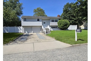 This mint 4 bedroom, 2 full bath hi ranch home is a must see !