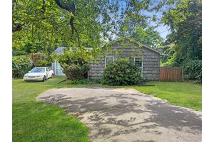 Unlock the potential of this 4 bedroom, 1 bathroom home located South of the highway in Southampton.