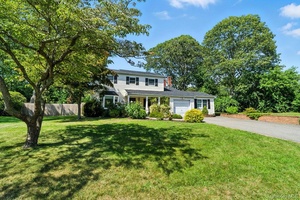 Welcome to 26 Concord Drive, a spacious 3 bedroom, 2.