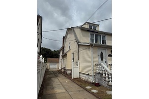 Welcome to 119 42 189th Street a well maintained 2 family home offering excellent income potential.
