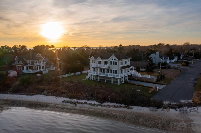 Aerial view at dusk with a water view