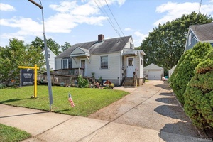 This Cape is conveniently located very near by to the hamlet of Down Town Bethpage, all shops, library, worship, transportation highways amp ; LIRR.