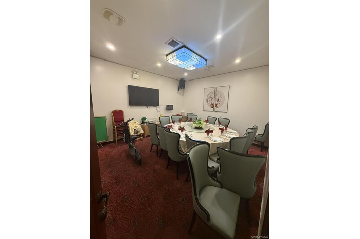 View of carpeted dining space