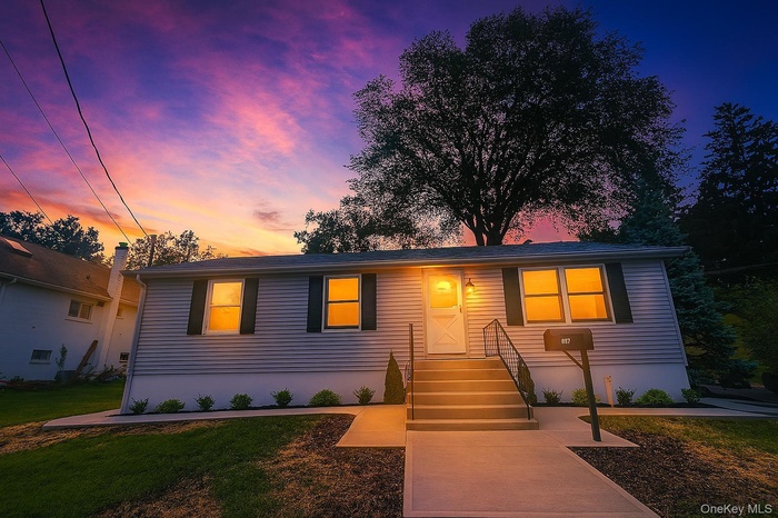 View of front of home with a front yard