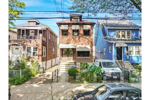 Welcome to this solid brick, detached 2 family home nestled on a peaceful, tree lined street on Wickham Avenue in the heart of the North Bronx.