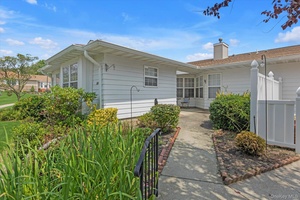 Sunny Essex model unit with an open floor plan.