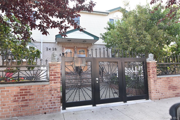 Gate with a fenced front yard