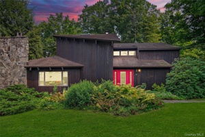 Enjoy this Sunlit Salt Point retreat with pool and custom charm !