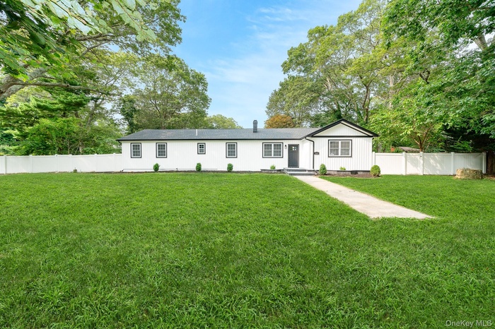 View of front of property featuring board and batten siding