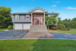 Nestled in the famed Candy Section and within the sought after Commack School District, this 4 bedroom, 3 bath Hi Ranch sits on a true half acre with room for ...