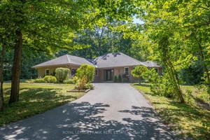 Set in the forest, just west of Peterborough near Millbrook is this 1800 sq ft brick bungalow with a double car garage that has been very well updated and feels ...