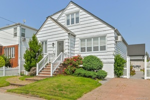 One family detached 4 bedroom Cape Cod on the old side of Howard Beach.
