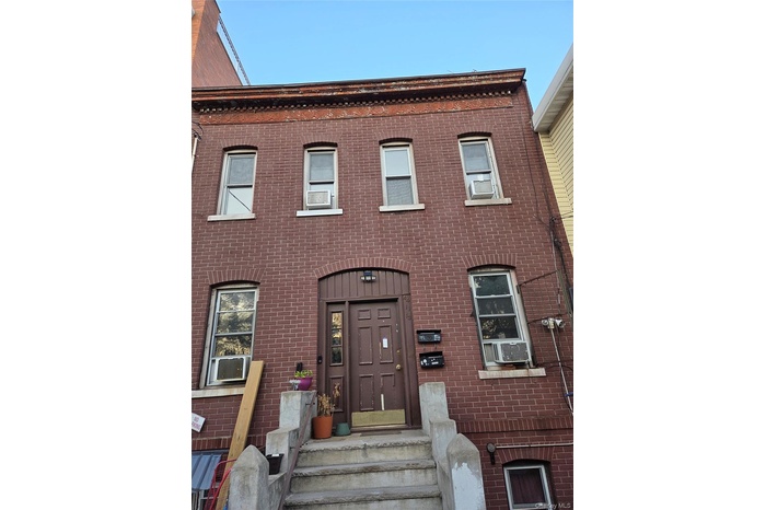 View of front of home with brick siding