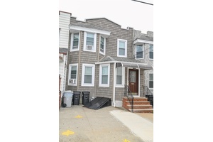 Charming to family with garage in Maspeth this legal two family home features a three bedroom unit over a two bedroom unit offering versatility for a living or renting income.