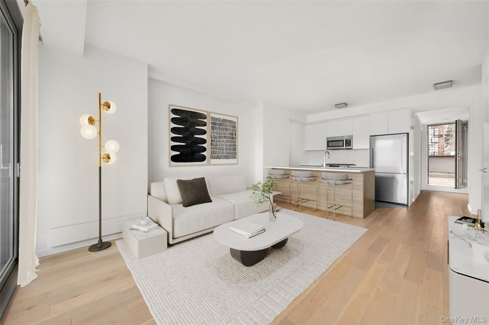 Living room featuring light wood-type flooring
