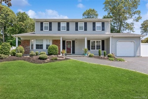 Spacious and Updated Colonial in Prime Lake Grove Location !