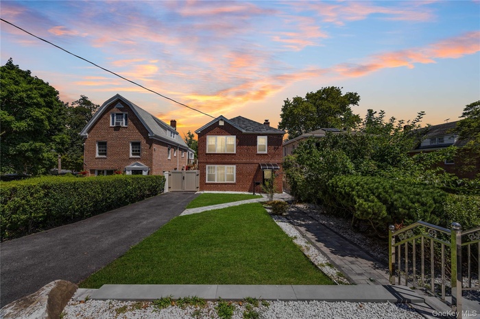 View of front of house with driveway