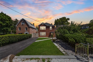 Custom detached brick home set back from the street on a 37.