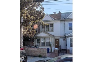 LEAGAL TWO FAMILY ATTACHED HOUSE AT THE CENTER OF EAST ELMHURST, CLOSE TO NORTHERN BLVD, CONVENIENT TRANSPORTATION.