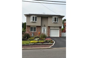 Welcome To This Bright And Inviting 5 Bedroom Home Situated In The Heart Of Bayville !