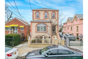Nestled in the desirable Pelham Gardens neighborhood, this beautifully maintained two family home offers the perfect blend of comfort and convenience.