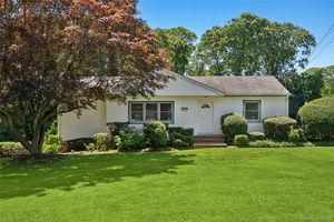 Located minutes away from the heart of downtown Hampton Bays, this 3 bedroom, 2.