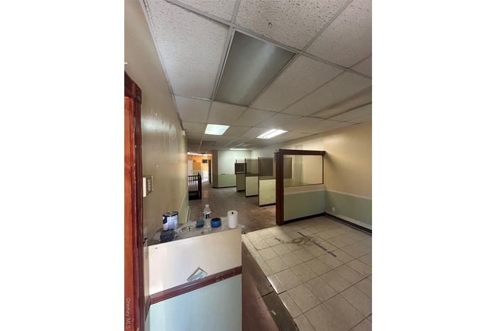 Welcome area featuring a paneled ceiling