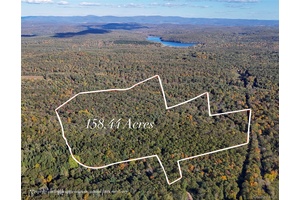 Seize a rare opportunity to own 158 acres of pristine, subdividable land in the heart of the Taconic Range, perfectly positioned between the coveted destinations of Rhinebeck and Hudson.